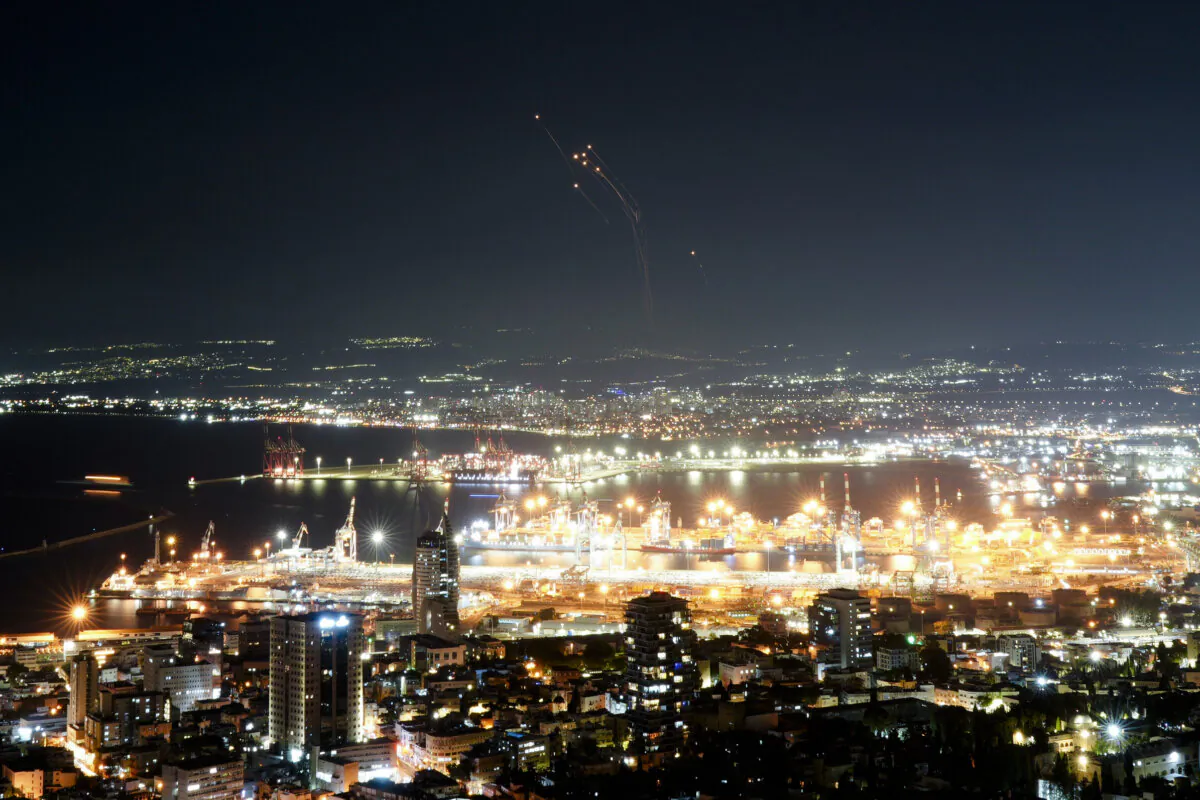 Israeli Iron Dome air defense system fires to intercept rockets that were launched from Lebanon, in northern Israel on Sept. 24, 2024. (AP Photo/Ohad Zwigenberg)