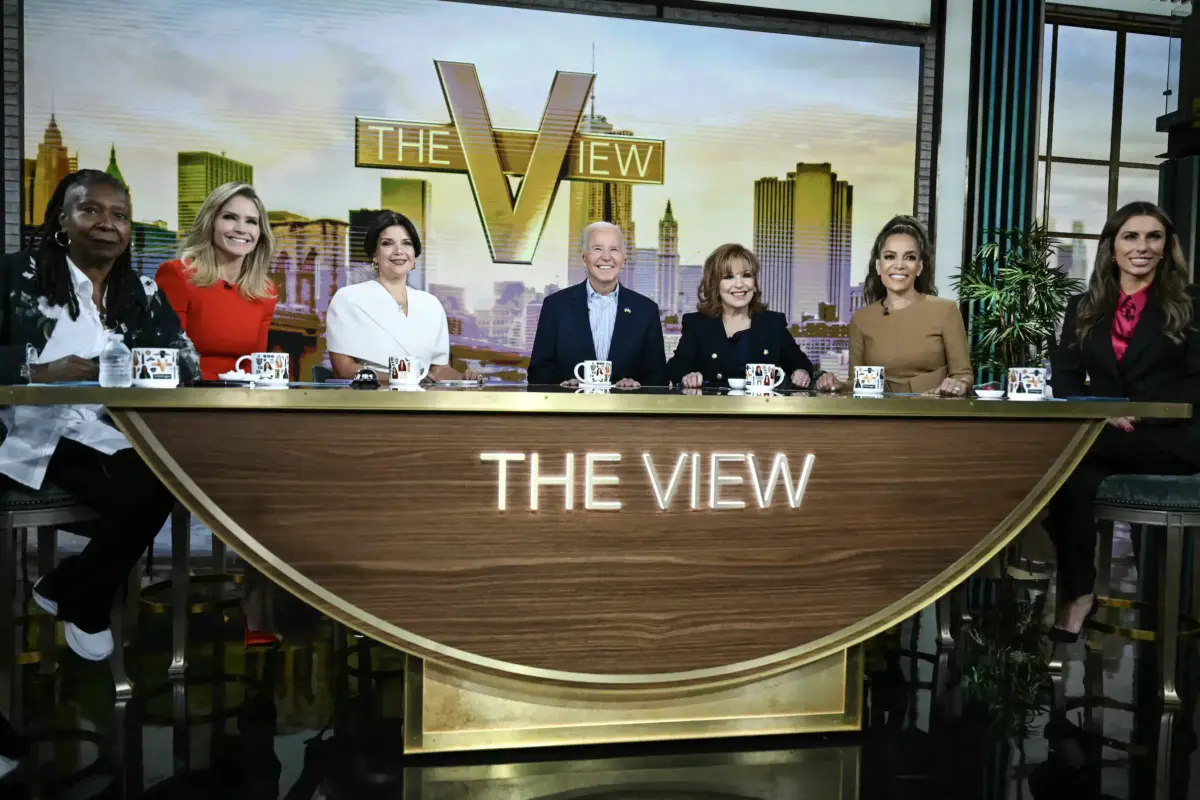 President Joe Biden (C) attends a live interview on ABC's "The View" in New York on Sept. 25, 2024. (L–R) The hosts are Whoopi Goldberg, Sara Haines, Ana Navarro, Joy Behar, Sunny Hostin, and Alyssa Farah Griffin. (Andrew Caballero-Reynolds/AFP via Getty Images)