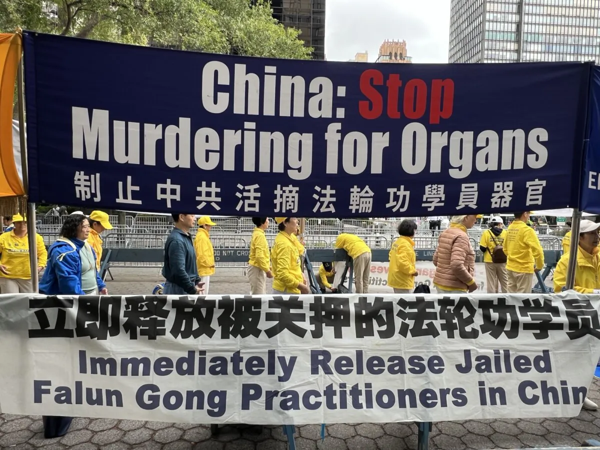 Falun Gong practitioners gathered in front of U.N. headquarters protest the Chinese Communist Party's ongoing persecution of Falun Gong and the regime's human rights abuses, during the annual General Assembly meeting in New York City on Sept. 25, 2024. (Sunny Zhao/The Epoch Times)