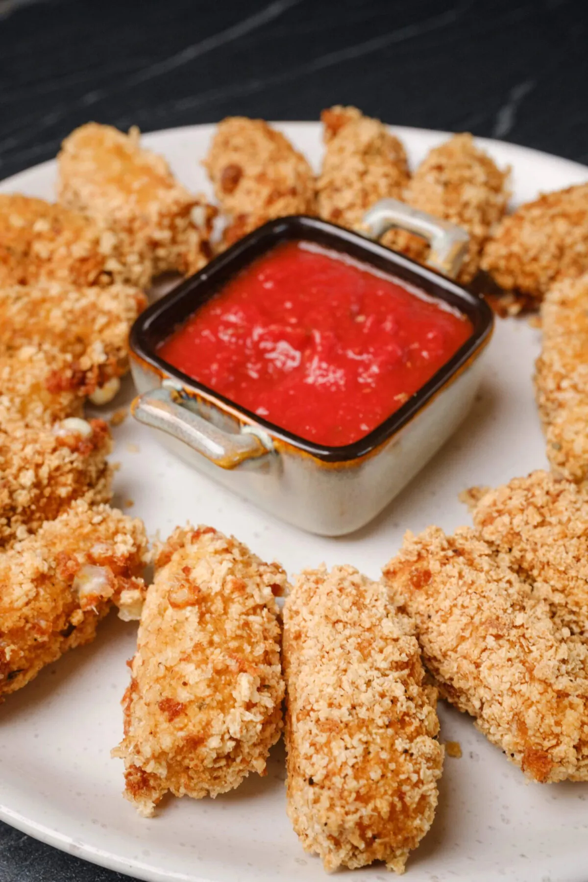 If you are a cheese fan and enjoy a good crunch, you'll really appreciate these Homemade Mozzarella Sticks, made with Panko breadcrumbs for an extra crispy exterior. (Amy Dong)