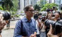 Hong Kong Journalist Sentenced to 21-Month Prison Term in Landmark Sedition Case