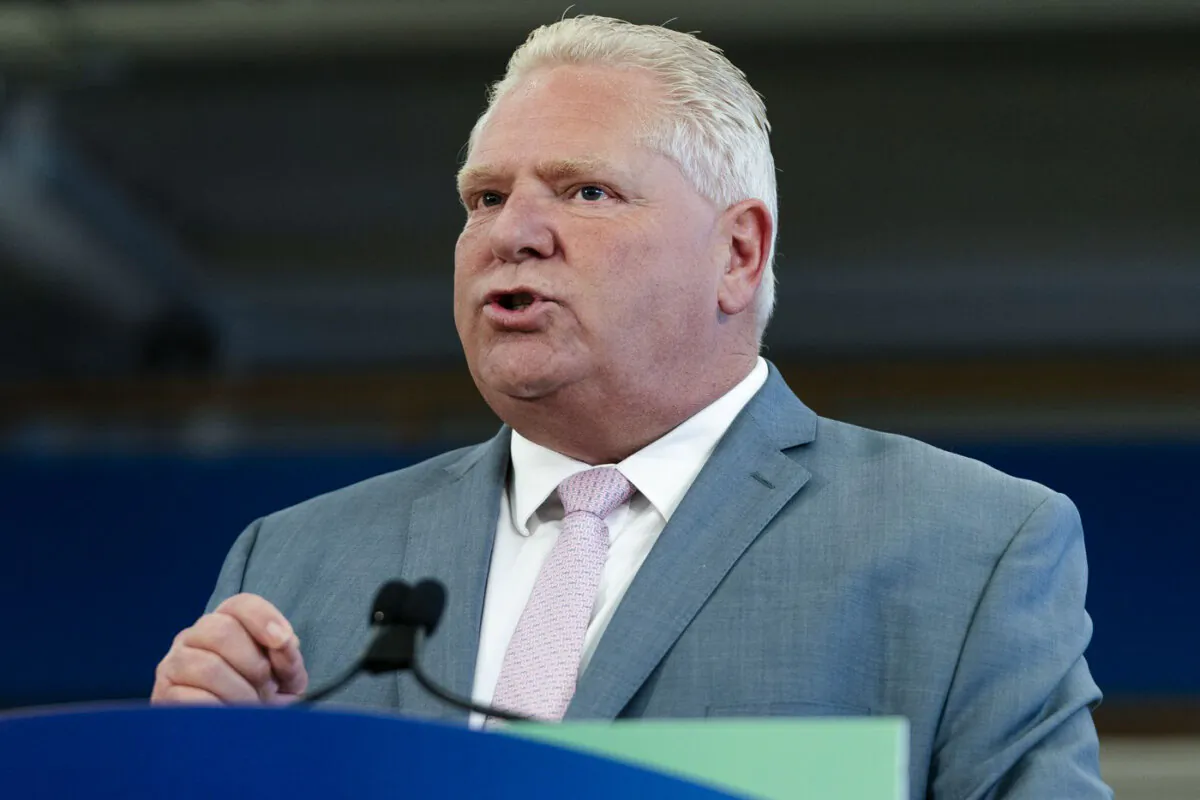 Ontario Premier Doug Ford delivers remarks at Lakeshore Collegiate Institute in Toronto, on Aug. 31, 2023. (The Canadian Press/Spencer Colby)