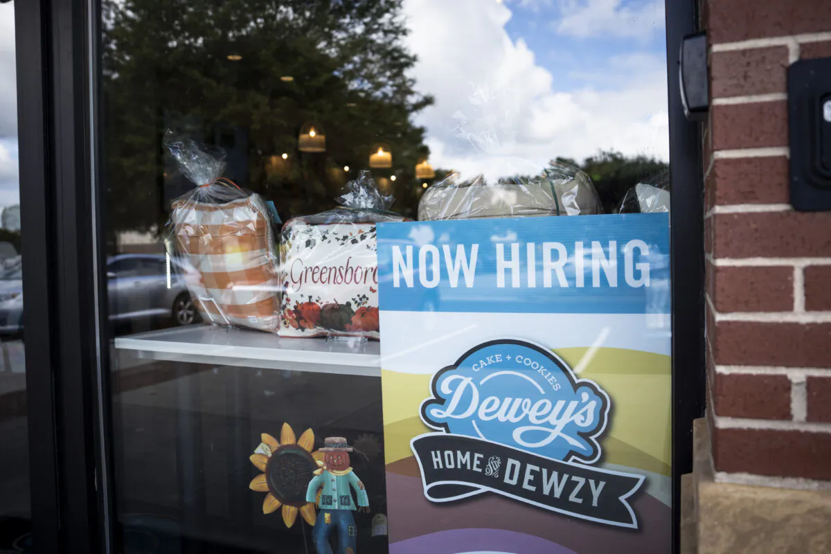 Now hiring sign at a coffee shop in Greensboro, N.C., on Sept. 19, 2024. (Madalina Vasiliu/The Epoch Times)