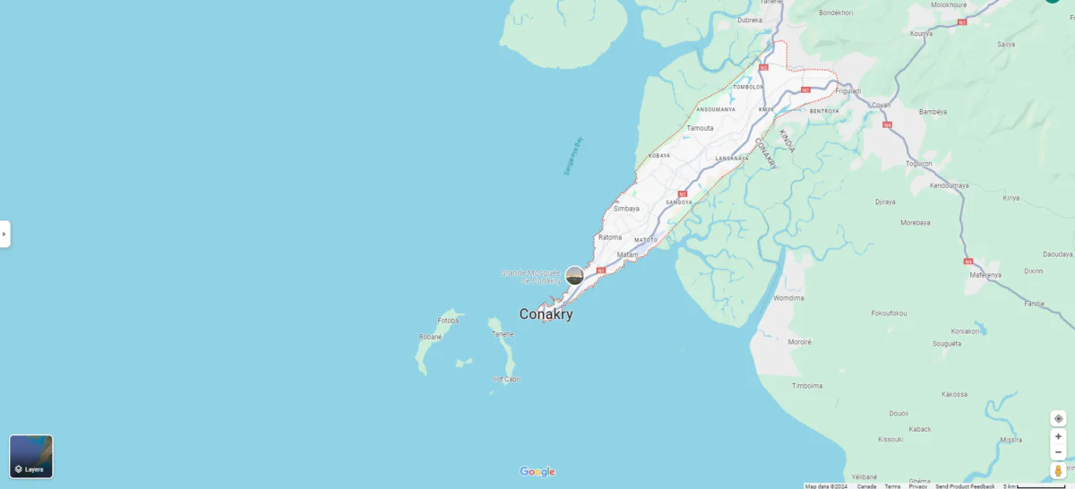 Shots were fired late Thursday near the presidential palace in Guinea’s capital Conakry, and the army locked down the city center and evacuated it. It wasn’t immediately clear who was shooting or why. (Screenshot via Google Map)
