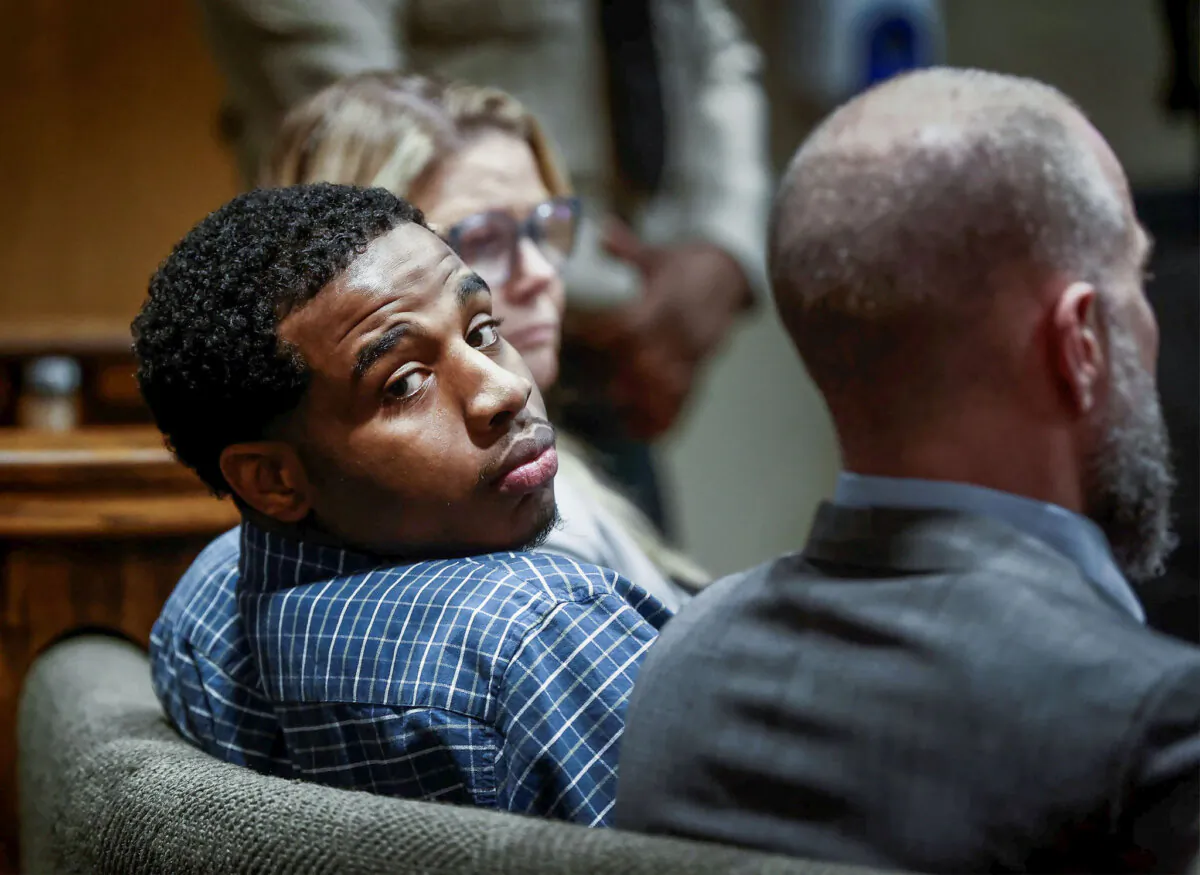 Defendant Justin Johnson, center, was found guilty of murder in the death of Memphis rapper Young Dolph, in court in Memphis, Tenn., on Thursday, Sept. 26, 2024. (Mark Weber/Daily Memphian via AP, Pool)