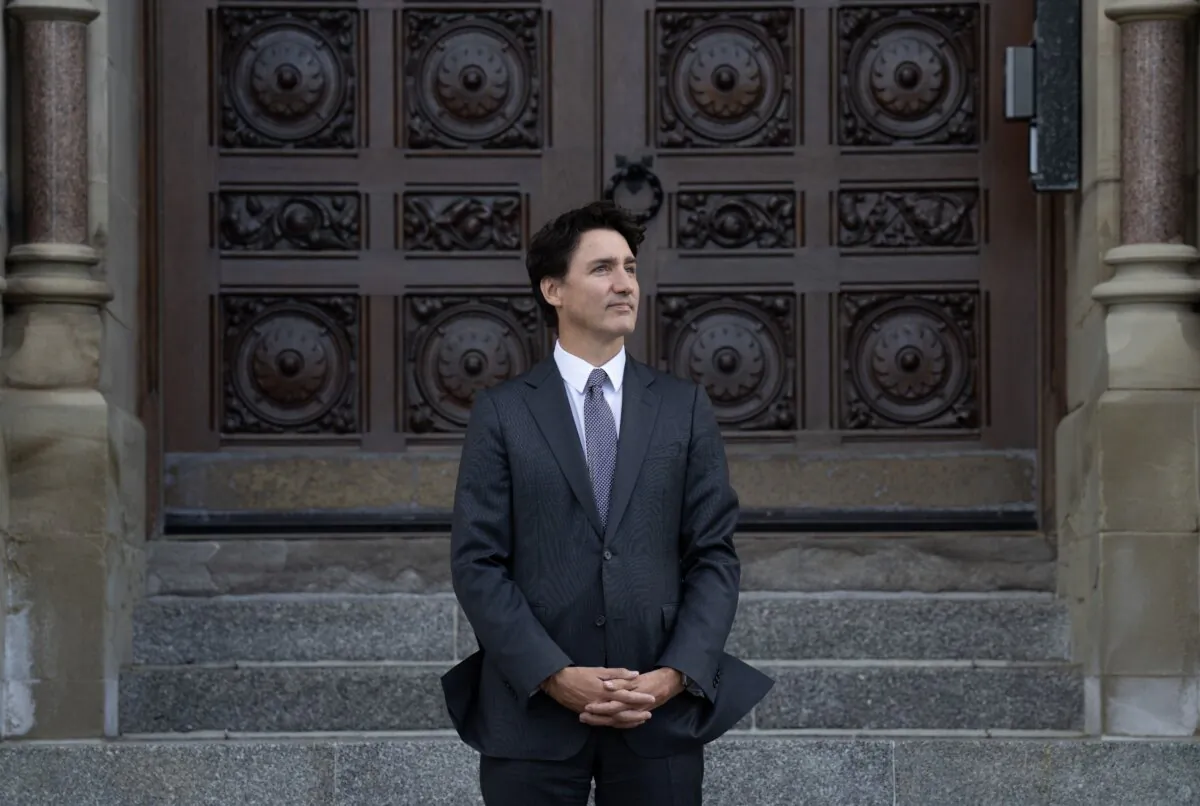 Prime Minister Justin Trudeau waits for French President Emmanuel Macron to arrive on Parliament Hill, in Ottawa, on Sept. 26, 2024. (The Canadian Press/Adrian Wyld)