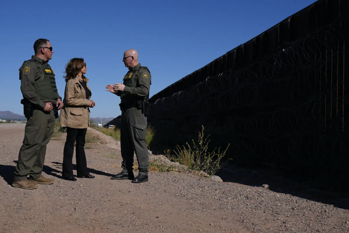 Democratic presidential nominee Vice President Kamala Harris (C) talks with John Modlin (R), the chief patrol agent for the Tucson Sector Border Patrol and Blaine Bennett, the Border Patrol Douglas Station border patrol agent in charge, as she visits the U.S.–Mexico border in Douglas, Ariz., on Sept. 27, 2024. (Carolyn Kaster/AP Photo)