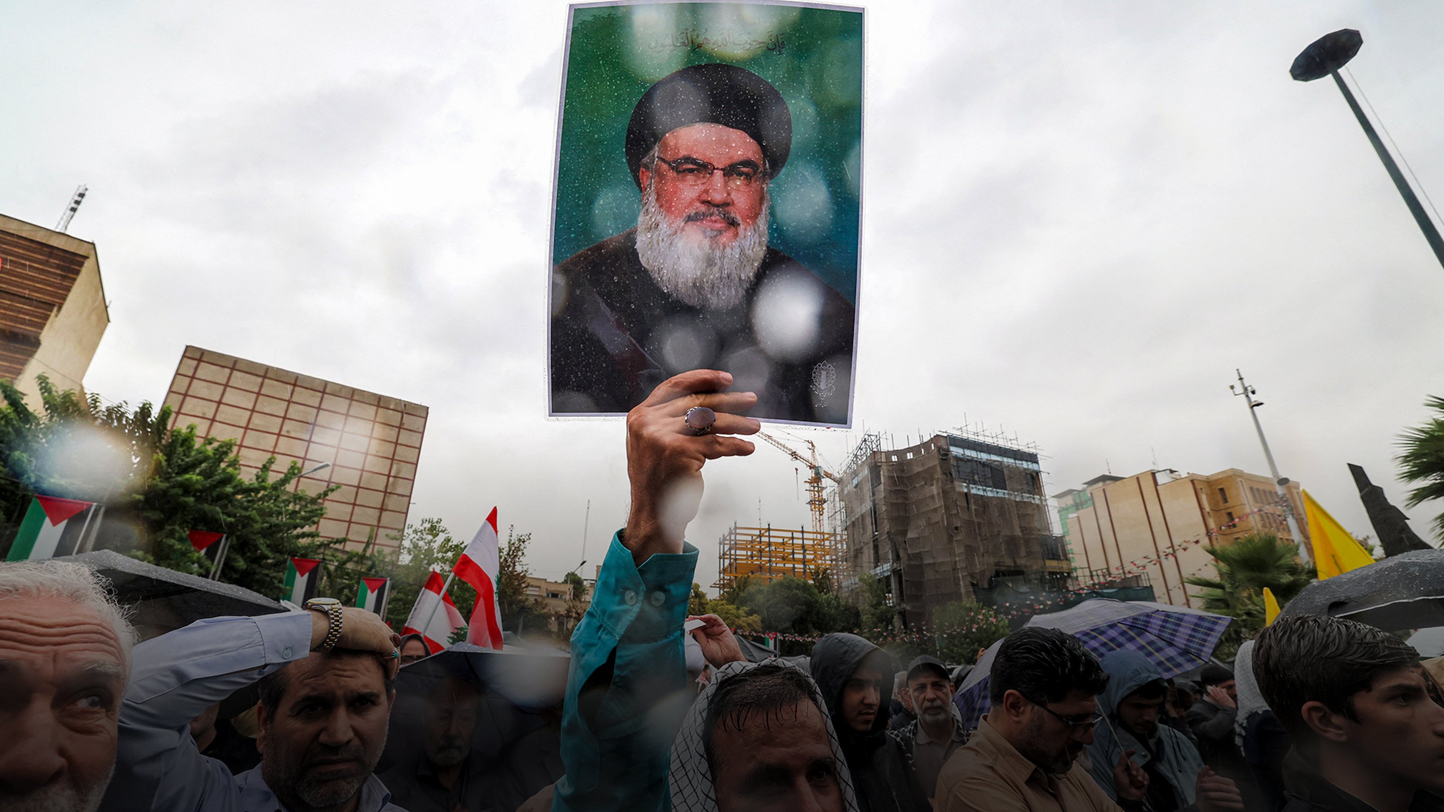 Day in Photos: Hezbollah Leader Killed, Disaster Aftermath, and Iron Baffalo Racing