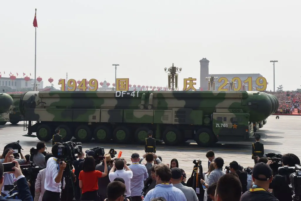 Military vehicles carry China's DF-41 nuclear-capable intercontinental ballistic missiles in a military parade at Tiananmen Square in Beijing on Oct. 1, 2019. (GREG BAKER/AFP via Getty Images)