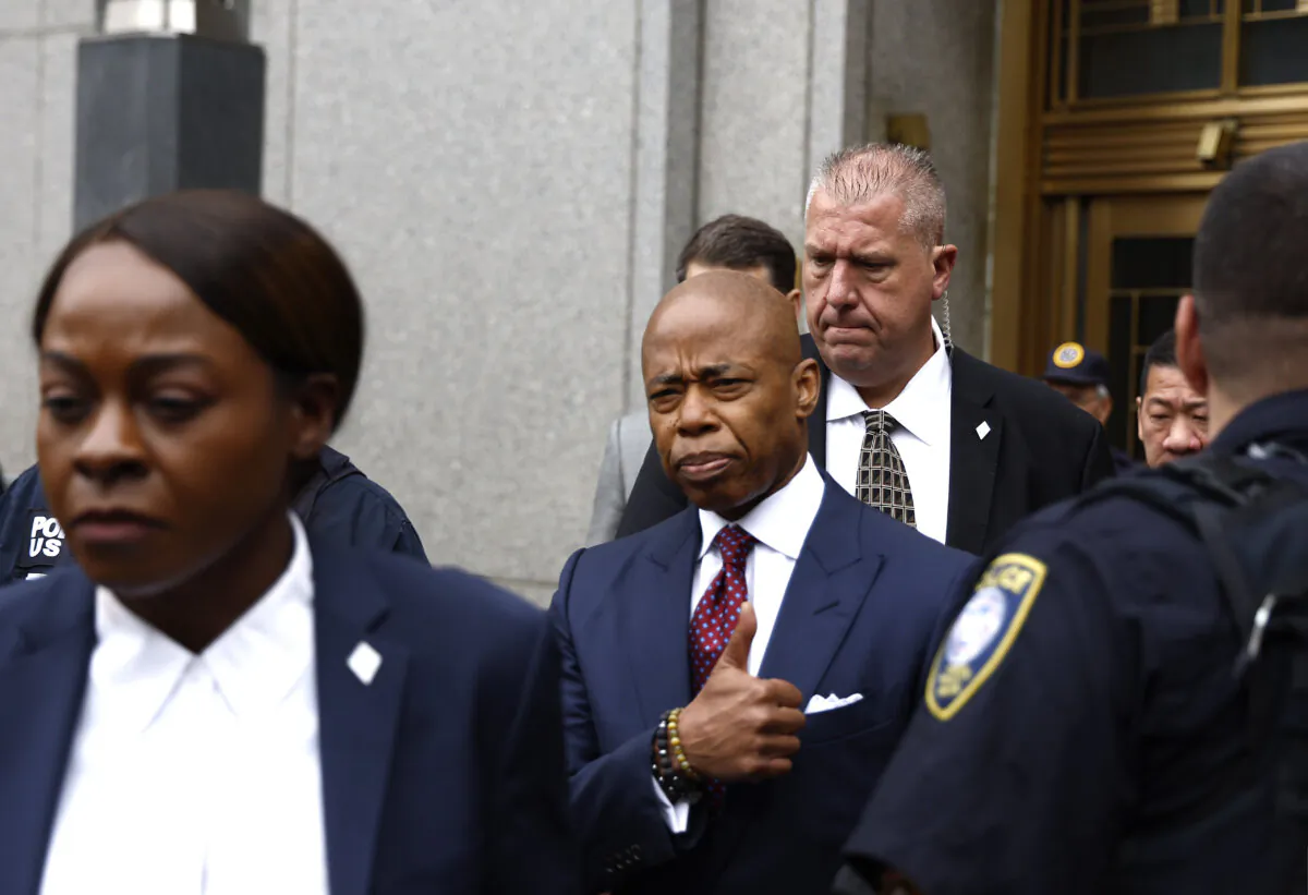 New York City Mayor Eric Adams exits federal court after his arraignment on bribery and fraud charges in New York City on Sept. 27, 2024. (John Lamparski/Getty Images)