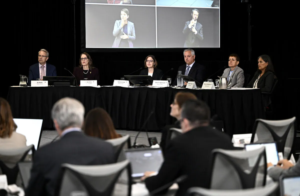 Representatives from the Canadian Security Intelligence Service, including interim director Vanessa Lloyd and former director David Vigneault, appear at the Foreign Interference Commission in Ottawa, on Sept. 27, 2024. From left: Bo Basler, Nicole Giles, Vanessa Lloyd, David Vigneault, Michelle Tessier and Cherie Henderson. (Justin Tang/The Canadian Press)