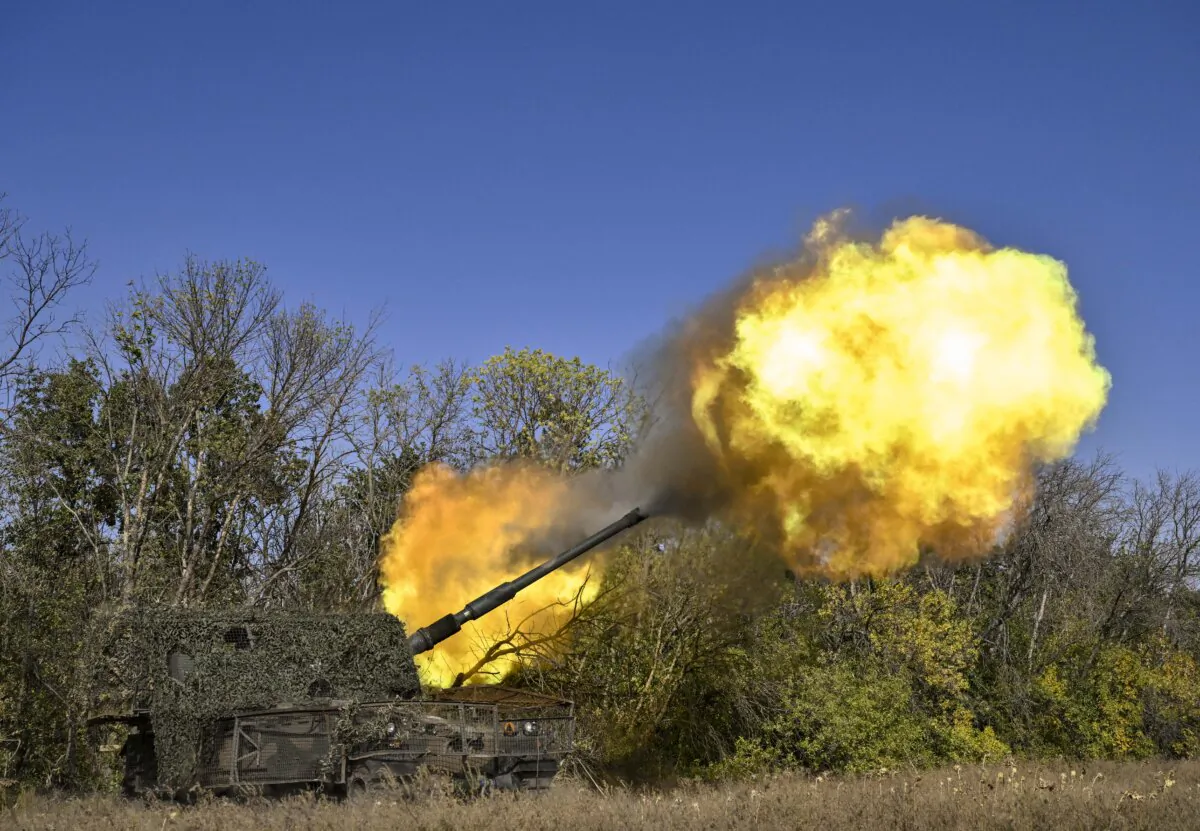 Amid the Russia–Ukraine war, Ukrainian servicemen of the 26th artillery brigade fire an AHS Krab self-propelled howitzer toward Russian positions near the front line in the Chasiv Yar area in the Donetsk region, Ukraine, on Sept. 30, 2024. (Genya Savilov/AFP via Getty Images)