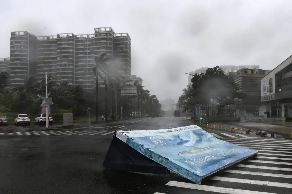 An advertisement billboard lands on a road following the landfall of typhoon Yagi in Haikou, south China's Hainan Province, on Sept. 6, 2024. (Yang Guanyu/Xinhua via AP)
