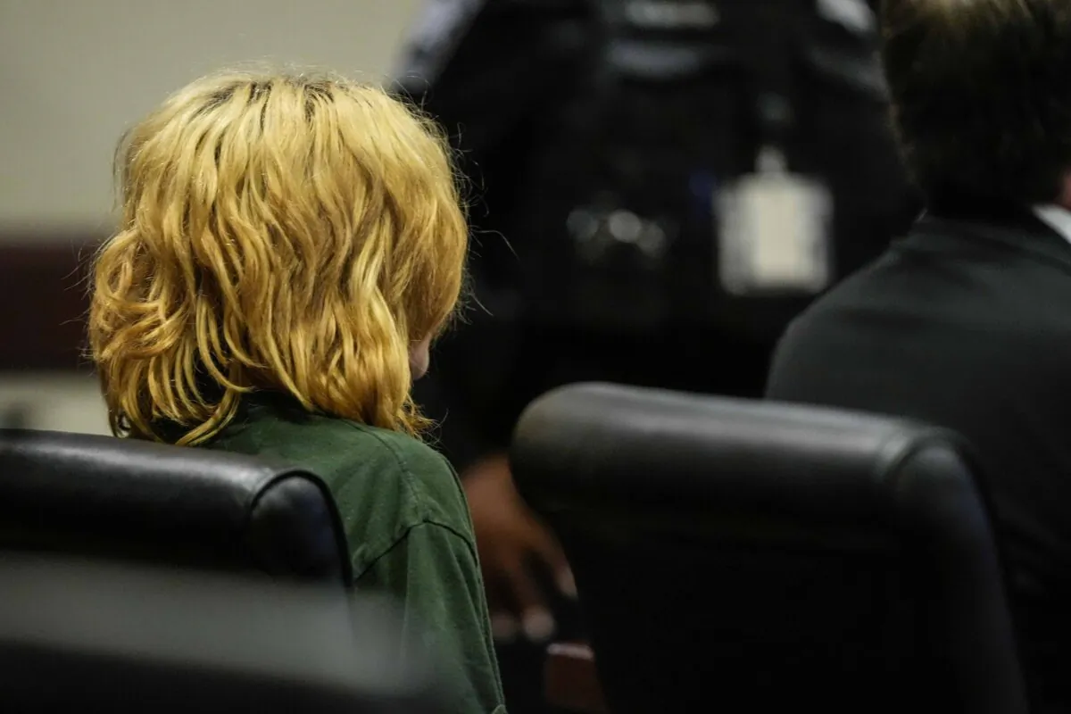 Colt Gray, 14, charged as an adult with four counts of murder, sits in the Barrow County Courthouse during his first appearance for the Sept. 4, 2024, shooting at Apalachee High School, in Winder, Ga., on Sept. 6, 2024. (Brynn Anderson/AP Photo, Pool)