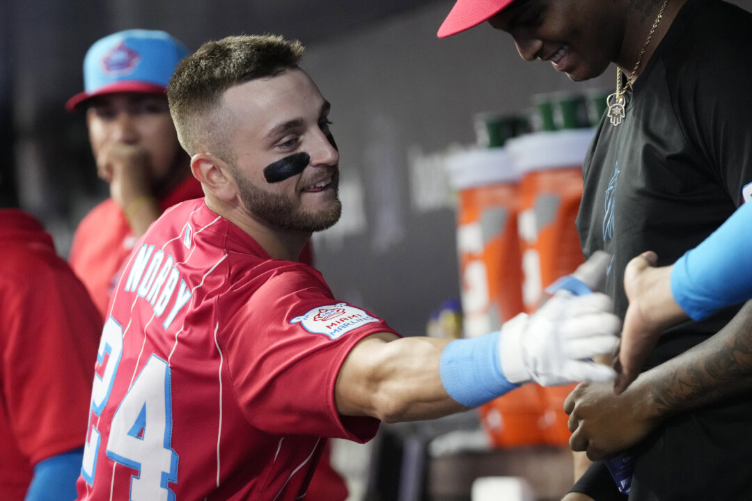 Marlins Beat Phillies 10-1, Tie Major League Record