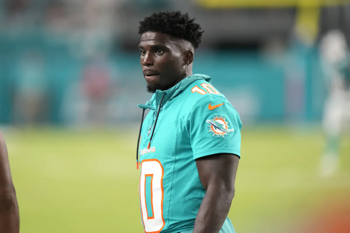 Miami Dolphins wide receiver Tyreek Hill watches from the sideline during the second half of a preseason NFL football game against the Washington Commanders in Miami Gardens, Fla., on Aug. 17, 2024. (Wilfredo Lee/AP Photo)