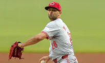 Martinez Retires 17 Straight Batters as the Reds Beat the Braves 1-0