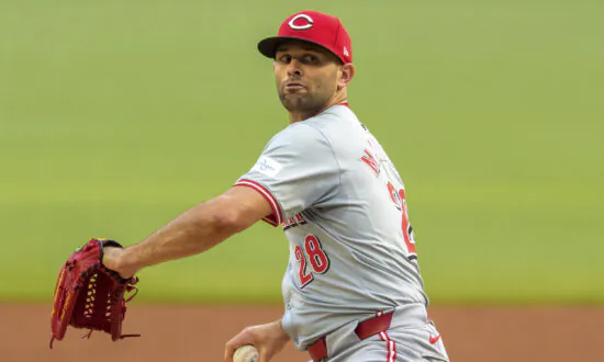 Martinez Retires 17 Straight Batters as the Reds Beat the Braves 1-0