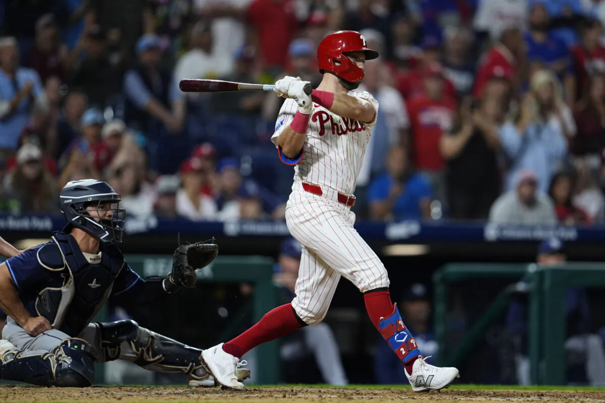 Philadelphia Phillies' Kody Clemens, right, watches his walkoff single off Tampa Bay Rays' Garrett Cleavinger during the ninth inning of a baseball game in Philadelphia, on Sept. 9, 2024. (Derik Hamilton/AP Photo)