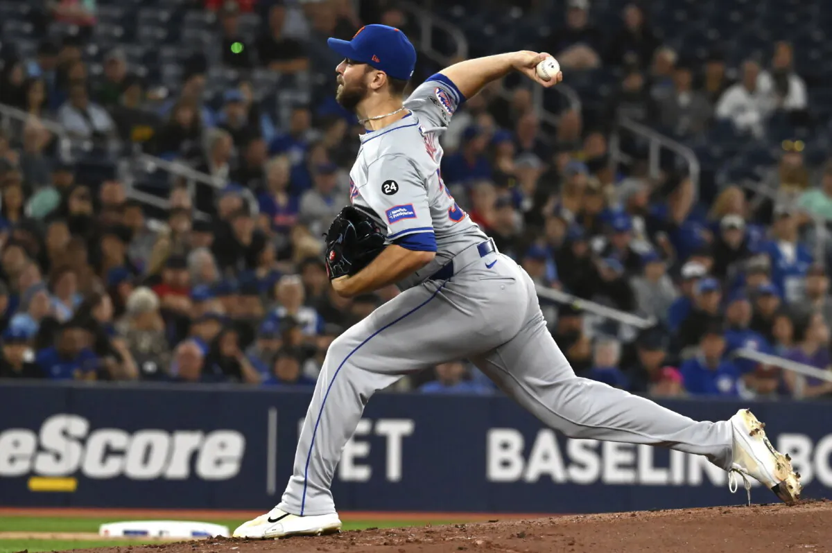 New York Mets starting pitcher Tylor Megill throws to a Toronto Blue Jays batter in the first inning of baseball game action in Toronto, Monday, Sept. 9, 2024. (Jon Blacker/The Canadian Press via AP)