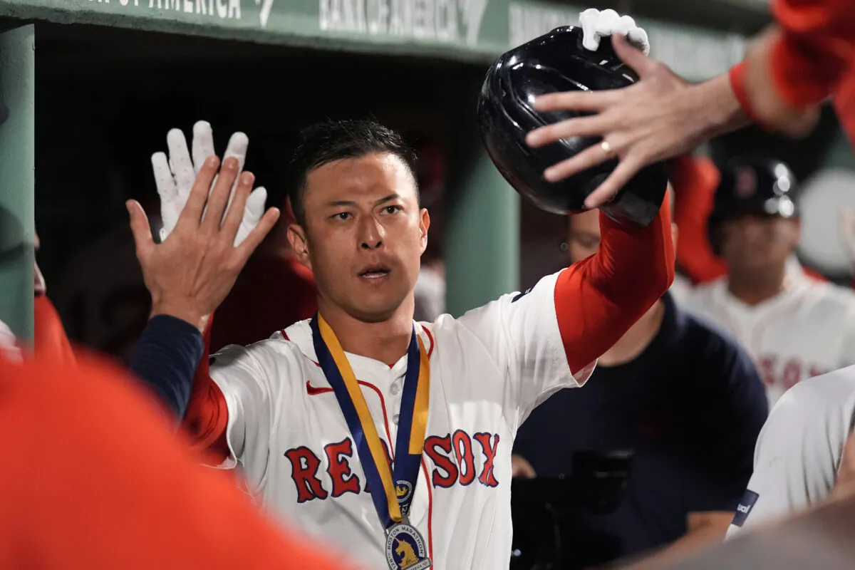 Boston Red Sox's Rob Refsnyder is congratulated after his two-run home run during the third inning of a baseball game against the Baltimore Orioles at Fenway Park in Boston, on Sept. 9, 2024. (Charles Krupa/AP Photo)