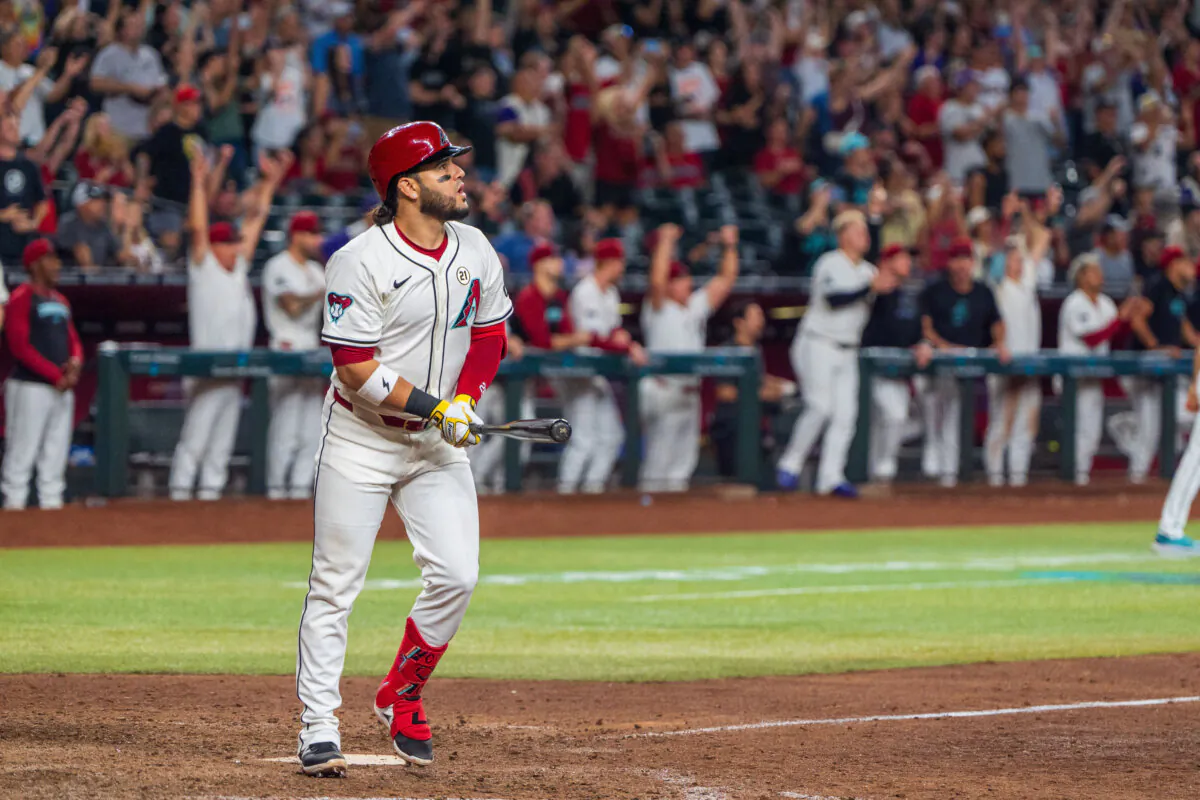 Arizona Diamondbacks infielder Eugenio Suárez (28) reacts after hitting a sharp fly ball to right field to score the winning runs in the tenth inning against the Milwaukee Brewers at Chase Field in Phoenix on Sep 15, 2024. (Allan Henry/Imagn Images via Reuters)