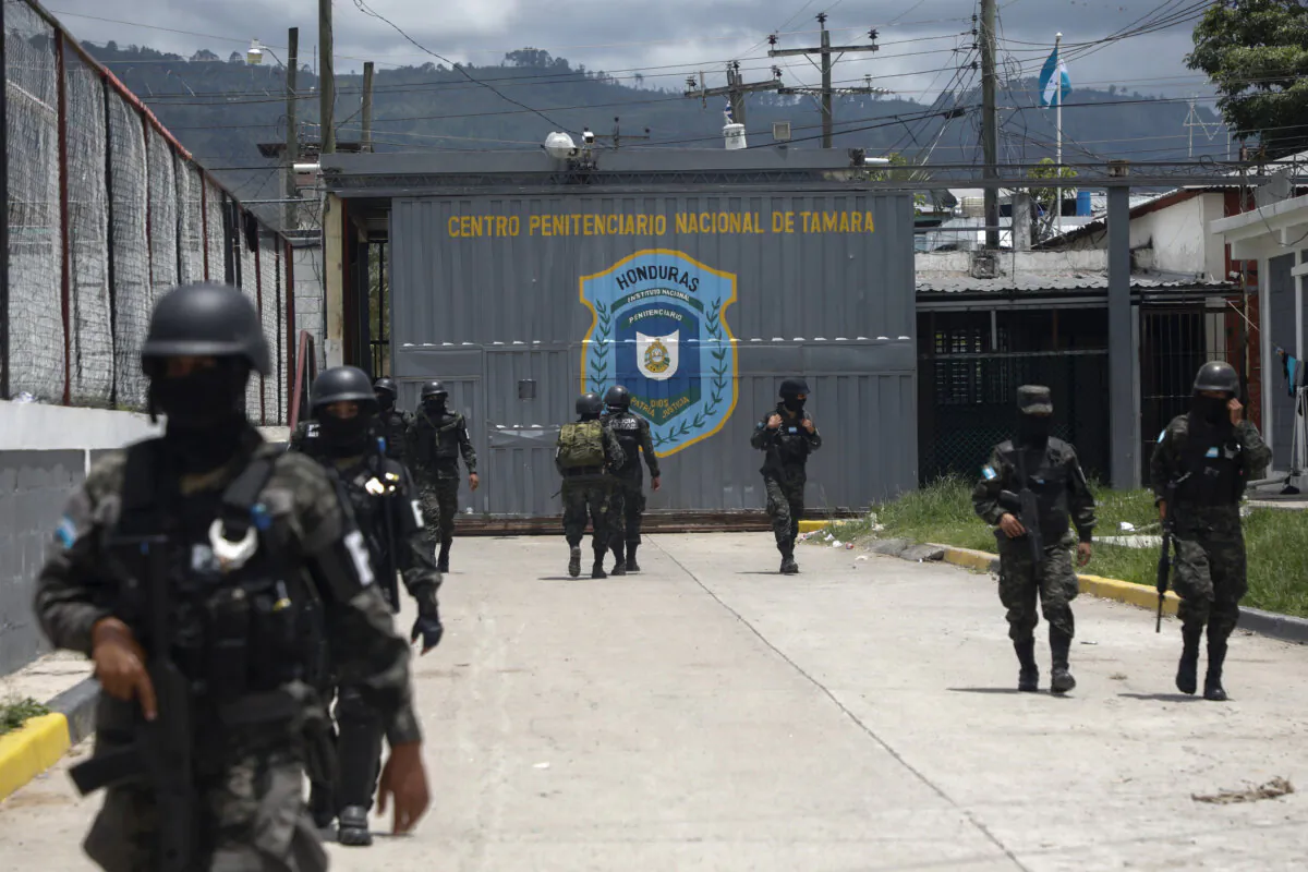 Military police guard the entrance to the National Penitentiary Center in Tamara, on the outskirts of Tegucigalpa, Honduras, on June 26, 2023. (Elmer Martinez/AP Photo)