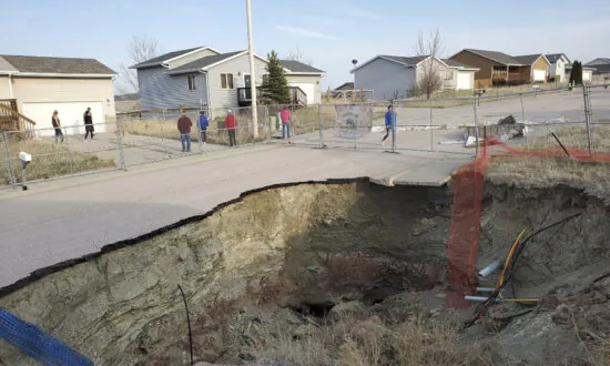 Giant Sinkholes in South Dakota Neighborhood Make Families Fear for Their Safety