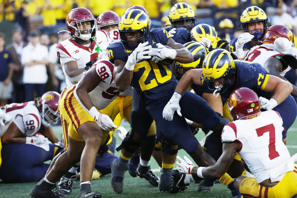 Michigan Wolverines running back Kalel Mullings (20) rushes for a touchdown in the second half against the USC Trojans at Michigan Stadium in Ann Arbor, Mich., on Sept. 21, 2024. (Rick Osentoski/Imagn Images via Reuters)