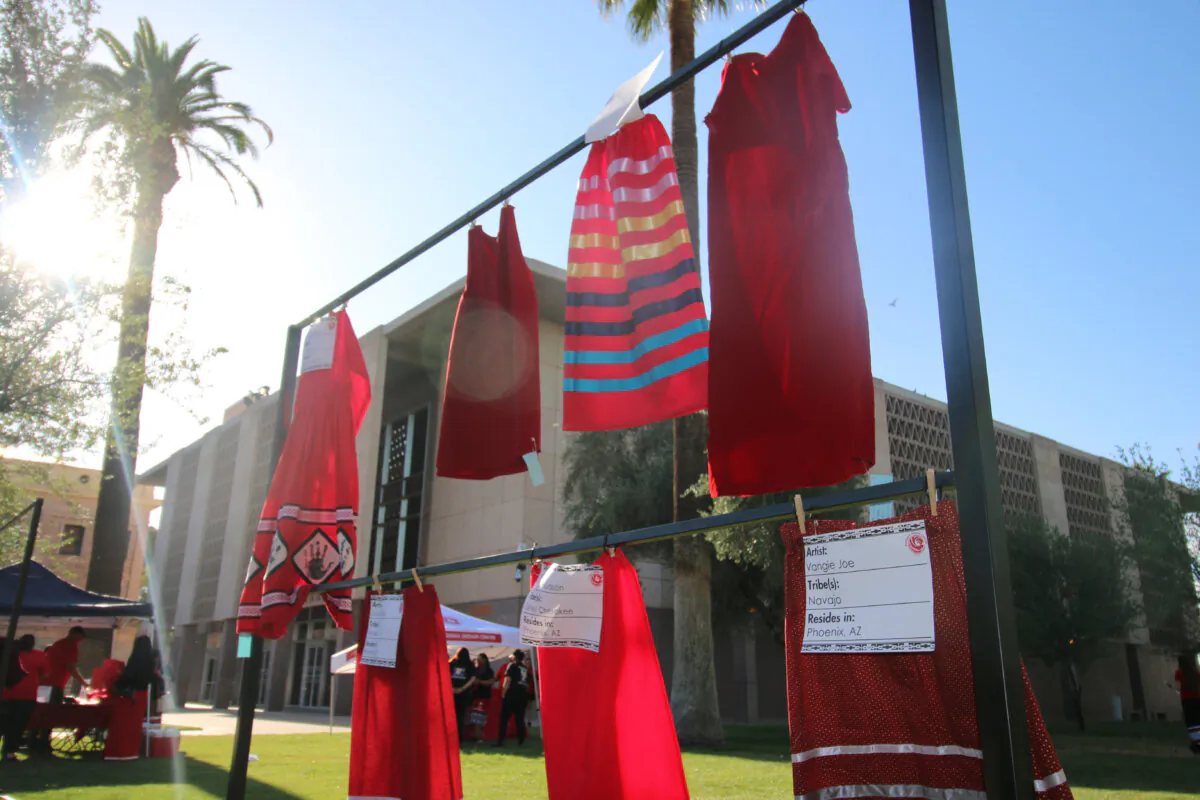 FILE - Red skirts are on display at the Arizona State Capitol in Phoenix, May 5, 2021, to raise awareness for missing and murdered Indigenous women and girls. (AP Photo/Cheyanne Mumphrey, File)