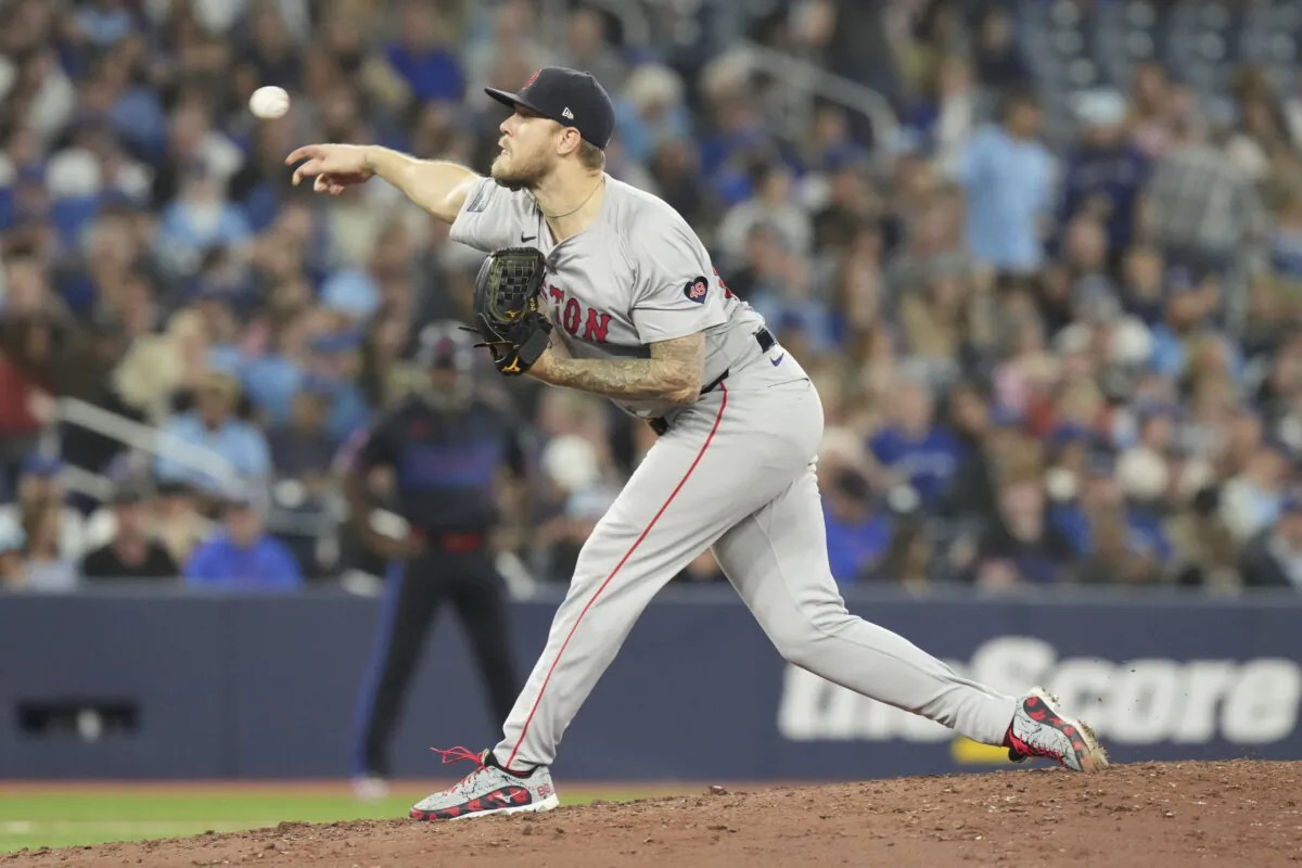 Boston Red Sox pitcher Tanner Houck works against the Toronto Blue Jays during fourth-inning baseball game action in Toronto, Monday, Sept. 23, 2024. (Chris Young/The Canadian Press via AP)