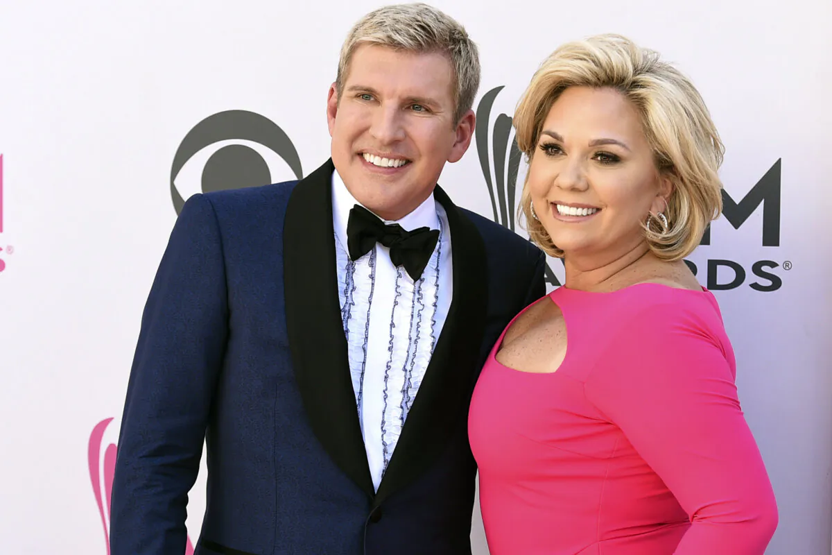 Julie Chrisley, right, and her husband Todd Chrisley pose for photos at the 52nd annual Academy of Country Music Awards on April 2, 2017, in Las Vegas. (Jordan Strauss/Invision/AP)