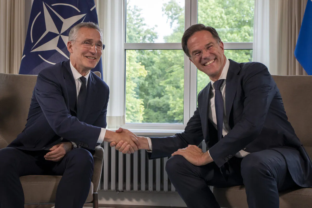 NATO Secretary General Jens Stoltenberg, (L), and his successor, Mark Rutte (R) meet in The Hague, The Netherlands, on June 27, 2023. (Peter Dejong/AP)