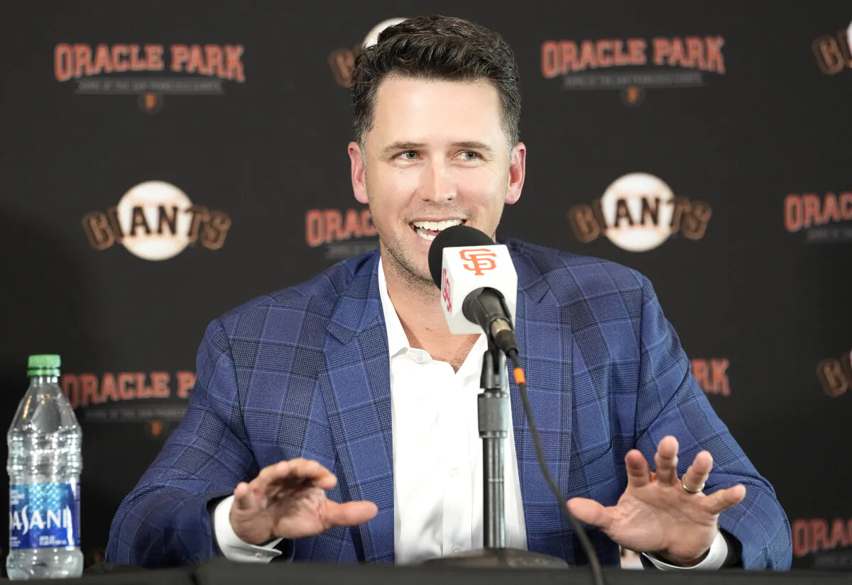 Buster Posey #28 of the San Francisco Giants speaks at a press conference announcing his retirement from Major League Baseball at Oracle Park  in San Francisco, Calif., on Nov. 4, 2021. (Thearon W. Henderson/Getty Images)