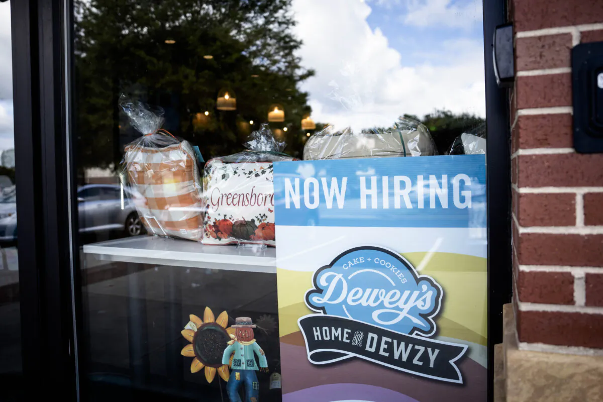 A 'Now Hiring' sign at a coffee shop in Greensboro, N.C., on Sept. 19, 2024. (Madalina Vasiliu/The Epoch Times) 