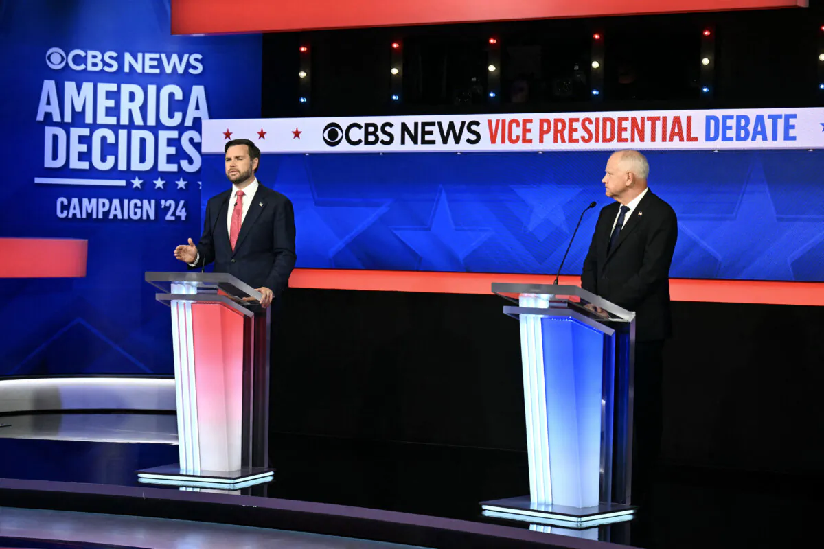 Republican vice presidential nominee Sen. JD Vance (R-Ohio) (L) and Minnesota Gov. and Democratic vice presidential nominee Tim Walz participate in the vice presidential debate hosted by CBS News at the CBS Broadcast Center in New York on Oct. 1, 2024. (Angela Weiss/AFP via Getty Images)