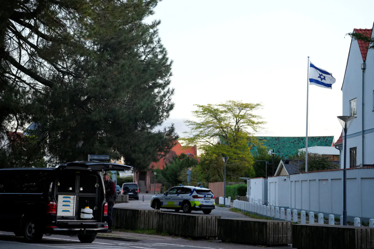 A police vehicle is seen as police officers investigate two blasts near the Israeli embassy in Copenhagen, Denmark, on Oct. 2, 2024. (Ritzau Scanpix/via Reuters)