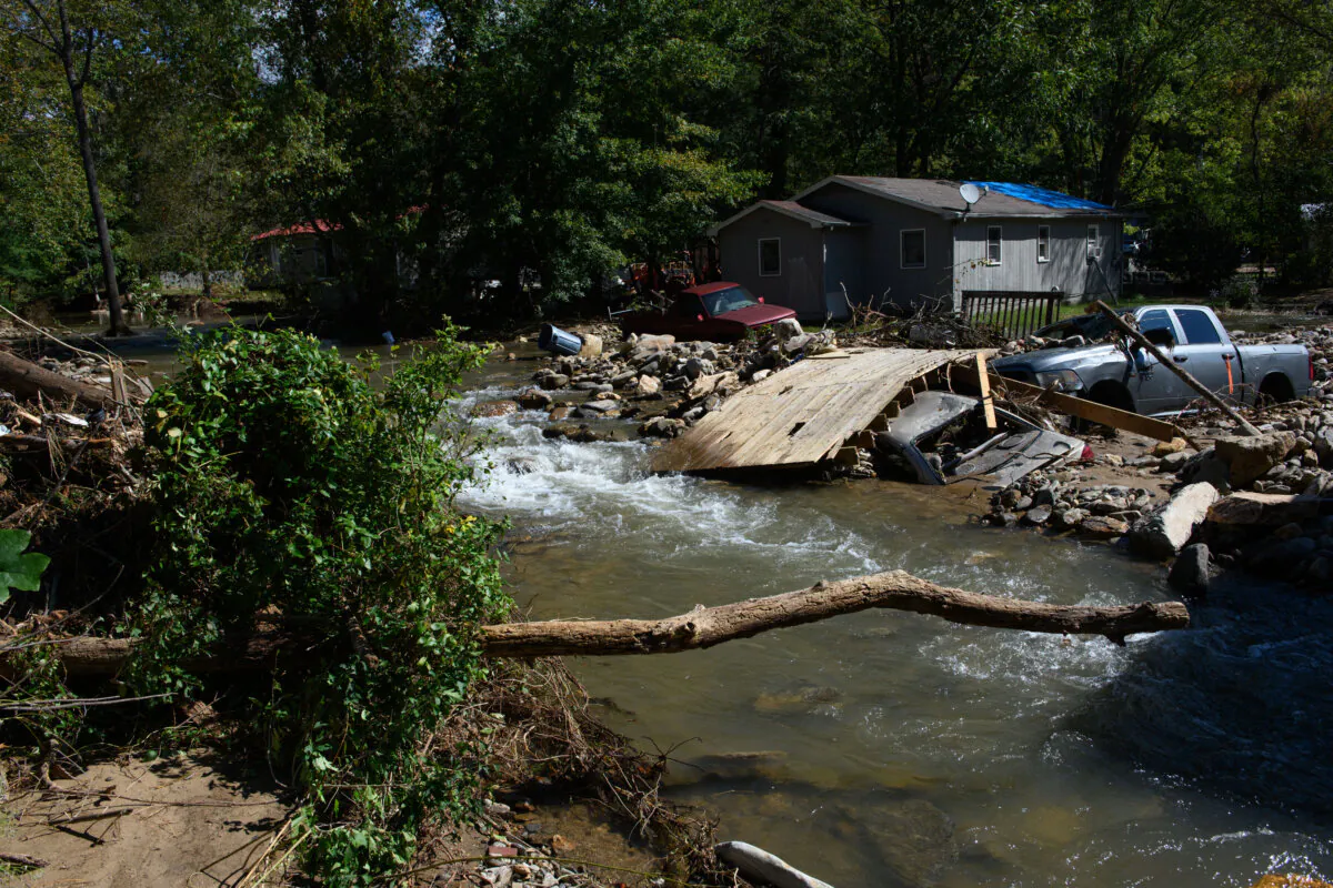 Damage to homes and vehicles along with evidence of re-routed streams in Black Mountain, N.C., on Oct. 2, 2024. (Melissa Sue Gerrits/Getty Images)