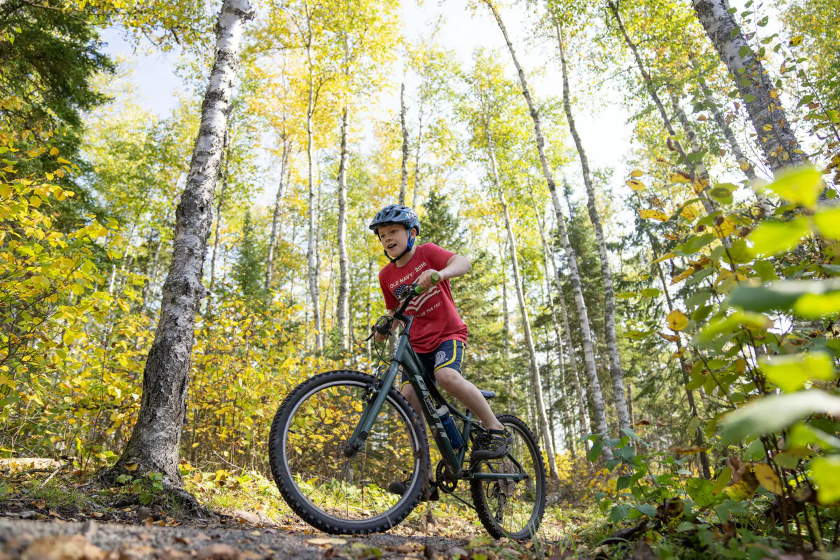 David Erickson, 10, mountain bikes through the Split Rock Wilds Mountain Bike Trail System in Two Harbors, Minnesota, on Oct. 3, 2023. (Alex Kormann/Minnesota Star Tribune/TNS)