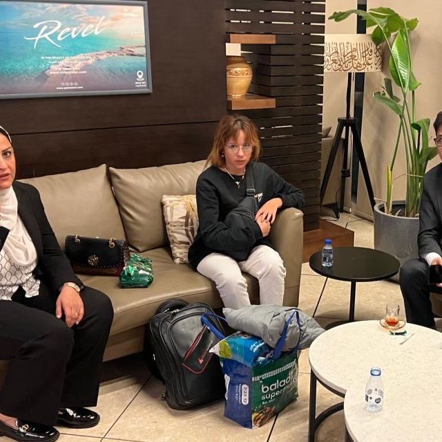 Fawzia Amin Sido (C) seen back in Iraq after after being rescued from Gaza in a photo released on October 3, 2024. (Iraqi Ministry of Foreign Affairs)