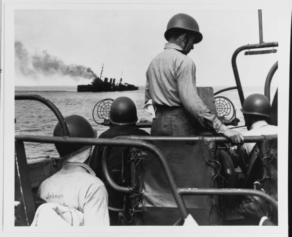 Being sunk as a target on 24 May 1946. She has already been bombed by aircraft and is now under fire by the 40mm single-gun mount in the foreground. (Official U.S. Navy Photograph, now in the collections of the National Archives.)