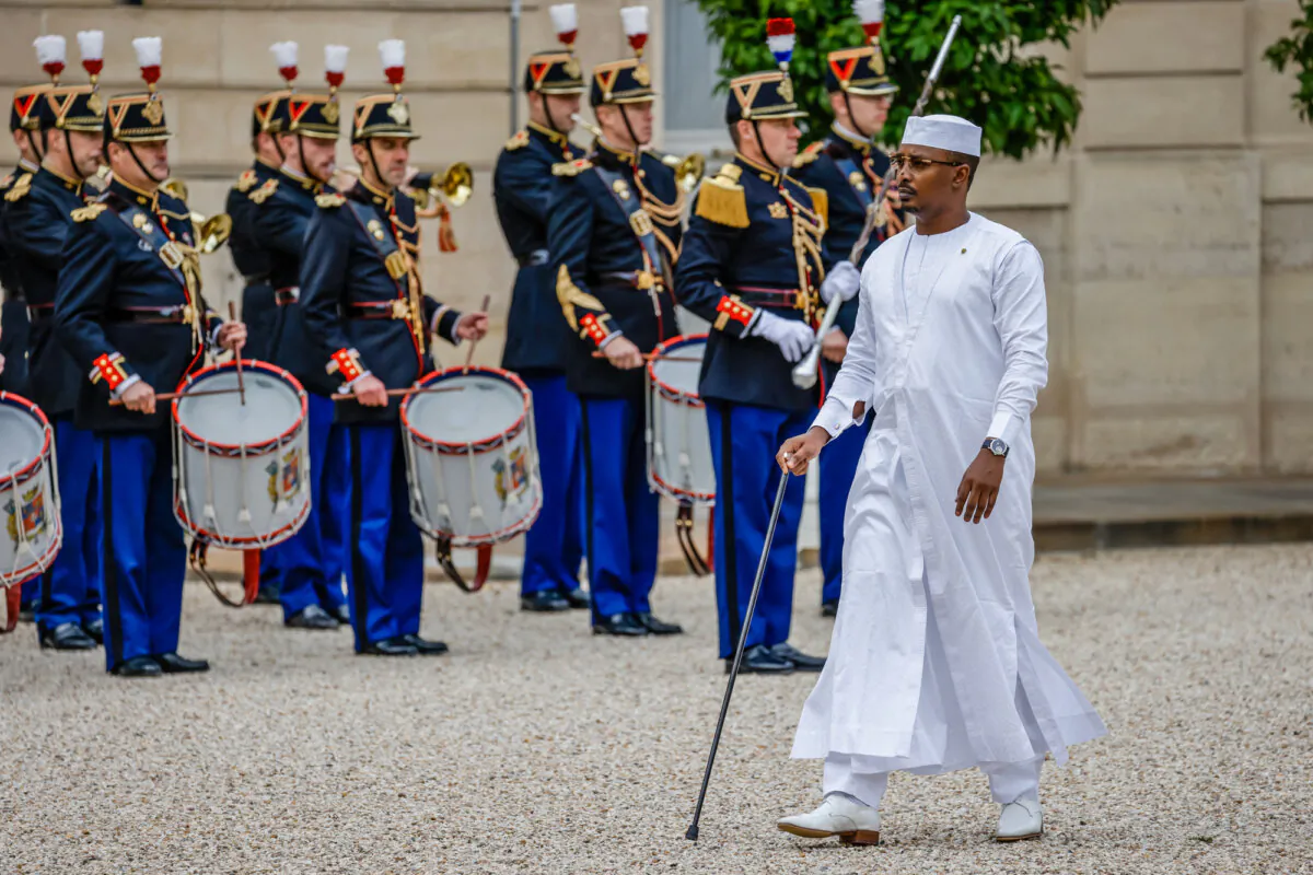 Chadian President Mahamat Idriss Deby reviews troops after arriving for a bilateral meeting with France's President on the sidelines of the 45th Francophonie Summit at the Elysee presidential palace in Paris on Oct. 3, 2024. (Ludovic Marin/AFP via Getty Images)