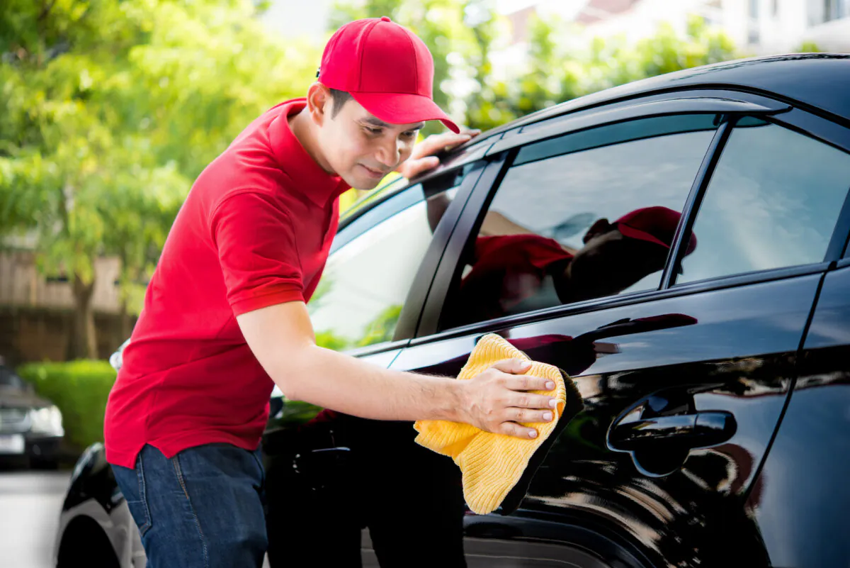 Washing your car is basic maintenance. (Atstock Productions/Shutterstock)