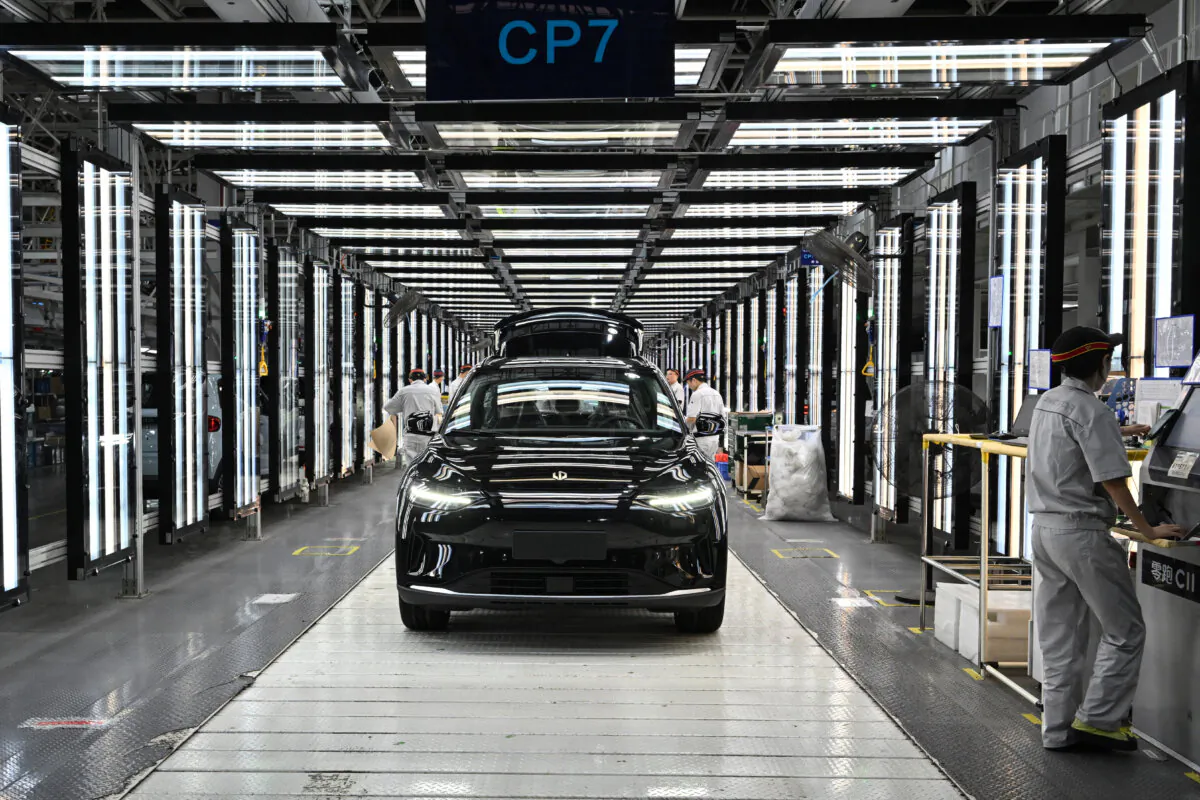 Employees work on an electric vehicle (EV) production line at the Leapmotor factory in Jinhua, China's eastern Zhejiang province, on Sept. 18, 2024. (Adek Berry/AFP via Getty Images)