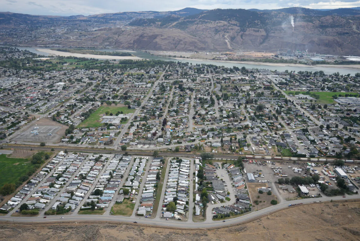 Houses and mobile homes are seen in an aerial view in a residential neighbourhood, in Kamloops, B.C., on Sept. 11, 2023. (The Canadian Press/Darryl Dyck)