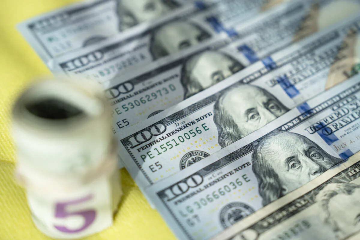 U.S. dollar bills in Washington on Oct. 4, 2024. (Madalina Vasiliu/The Epoch Times)