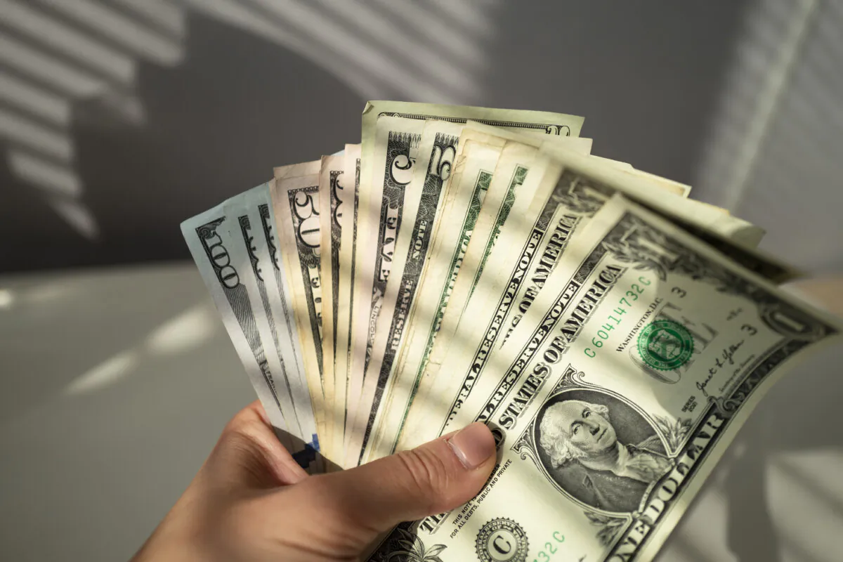U.S. dollar bills in Washington on Oct. 4, 2024. (Madalina Vasiliu/The Epoch Times)
