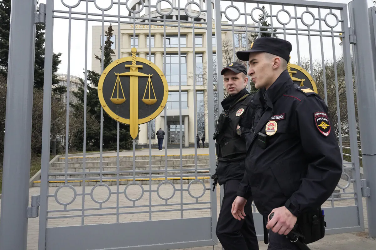 Police officers guard the Moscow City Court entrance, in Moscow, Russia, Monday, April 17, 2023. (Alexander Zemlianichenko/AP Photo)