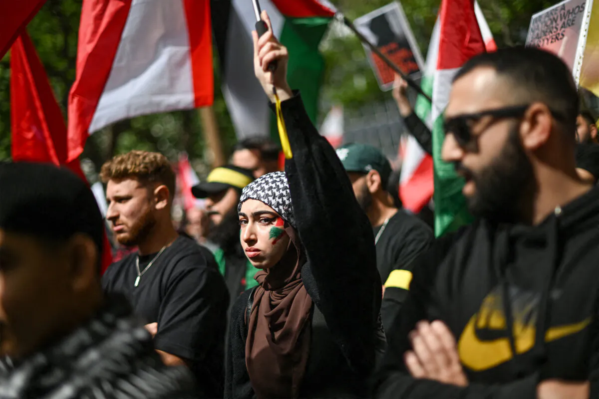 Demonstrators march through the streets against Israeli strikes in Gaza and Lebanon at a protest rally in the central business district of Sydney, Australia, on Sept. 29, 2024. (Saeed Khan/AFP via Getty Images)