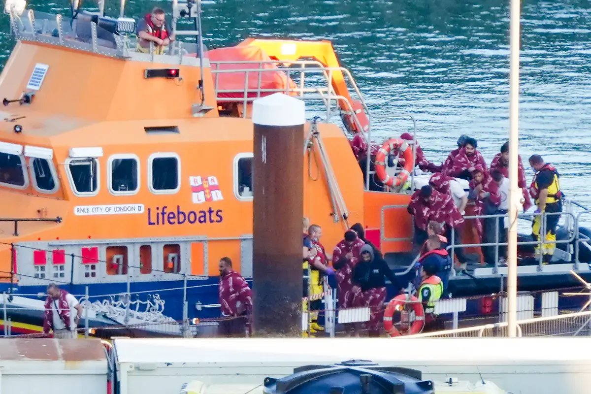 A group of people believed to be illegal immigrants are brought in by an RNLI lifeboat in Dover, England, on Oct. 5, 2024. (Gareth Fuller/PA Wire)